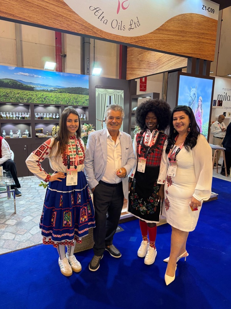 Visitors and the Alta Oils team in traditional Bulgarian costumes at the Alta Oils stand